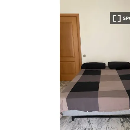 Rent this 4 bed room on Via Giuseppe Lorenzoni in 00143 Rome RM, Italy