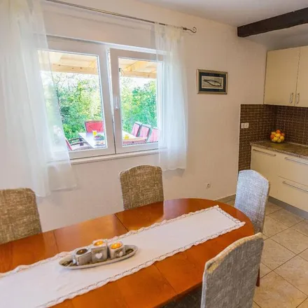 Rent this 4 bed house on 21257 Lovreć