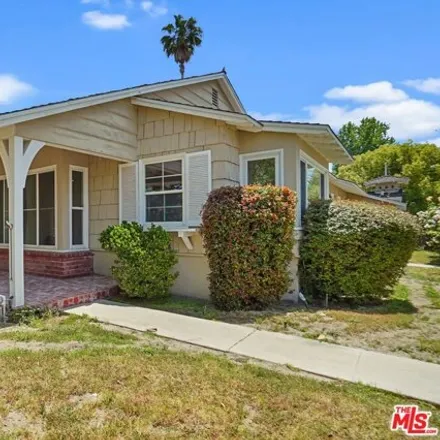 Rent this 4 bed house on 13060 Magnolia Blvd in Sherman Oaks, California