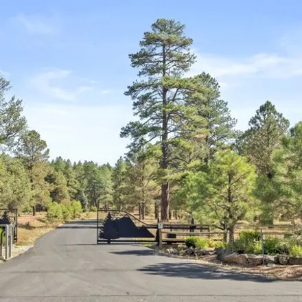 Buy this 3 bed house on 2298 Buckhorn Loop in Mountainaire, Coconino County