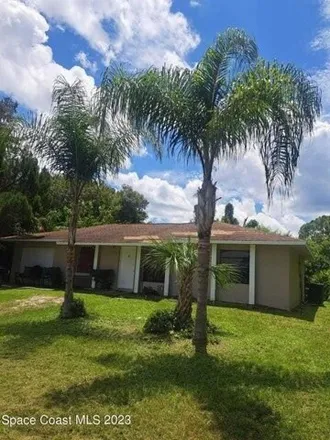Rent this 4 bed house on 753 Arabia Road Southeast in Palm Bay, FL 32909