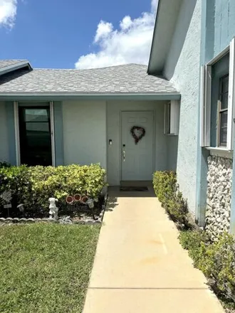 Buy this 3 bed townhouse on 9099 Southwest 22nd Street in Palm Beach County, FL 33428