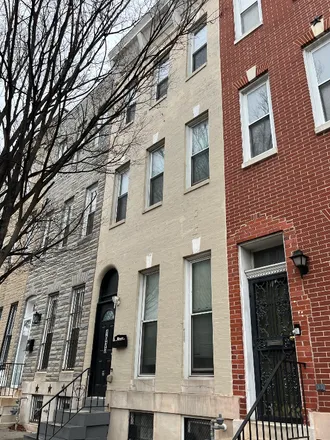 Rent this 4 bed townhouse on 1033 N Fulton Ave