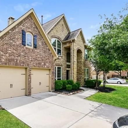 Rent this 4 bed house on 26975 Canyon Walk Lane in Cypress Creek Lakes, TX 77433
