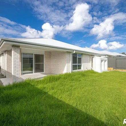 Rent this 4 bed apartment on Surfside Avenue in Pipers Bay NSW 2428, Australia
