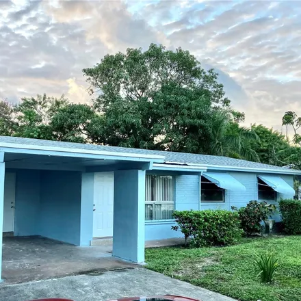 Buy this 4 bed house on 1800 Northwest 36th Terrace in Lauderdale Lakes, FL 33311