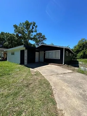 Buy this 4 bed house on 3081 North 19th Street in Beaumont, TX 77706