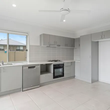 Rent this 2 bed apartment on 11 Raisbeck Parkway in North Rothbury NSW 2335, Australia