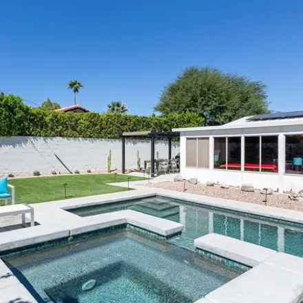 Rent this 4 bed house on 3083 East Via Escuela in Palm Springs, CA 92262