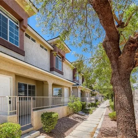 Rent this 3 bed townhouse on 1366 Dusty Creek Street in Las Vegas, NV 89128