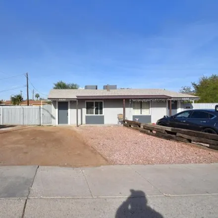 Rent this 3 bed house on 5028 West Midway Avenue in Glendale, AZ 85301