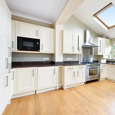 Rent this 4 bed townhouse on 27 Sandringham Avenue in London, SW20 8JY