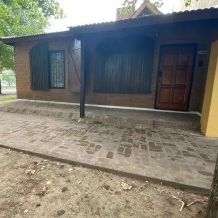 Buy this 3 bed house on Tucumán in Parque Mattaldi, B1661 INW Bella Vista