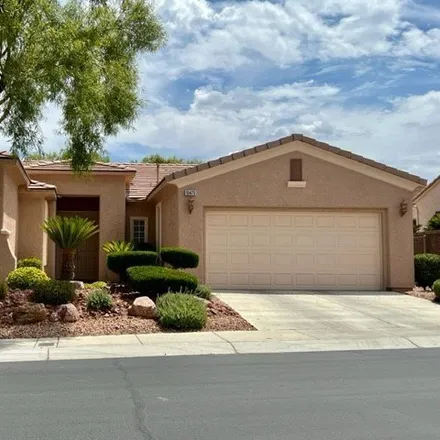Rent this 2 bed house on 10475 Luna Magico Avenue in Summerlin South, NV 89148