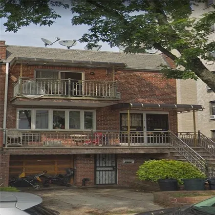 Buy this 8 bed townhouse on 1859 80th Street in New York, NY 11214