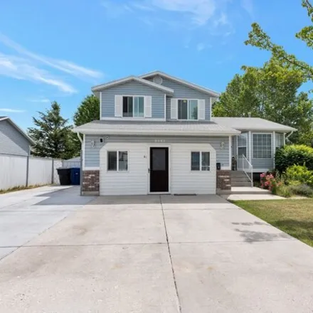 Buy this 4 bed house on 6089 4520 West in Kearns, UT 84118