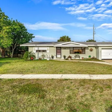 Buy this 3 bed house on 701 Croton Road in Melbourne, FL 32935