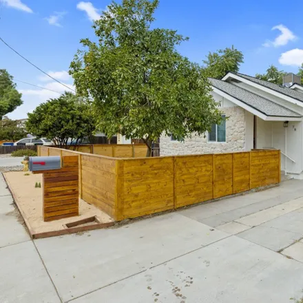 Buy this 4 bed house on 78 Magnolia Avenue in Lemoore, CA 93245
