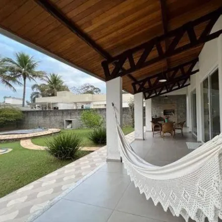 Buy this 3 bed house on Condomínio Vale do Sol in Avenida Luiz Gonzaga das Neves, Jardim Residencial Eldorado