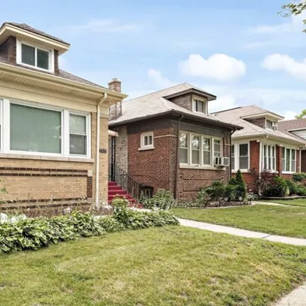 Buy this 2 bed house on 7826 South Paxton Avenue in Chicago, IL 60617