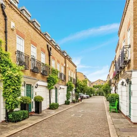 Buy this 2 bed townhouse on 20 Farrier Walk in London, SW10 9FW