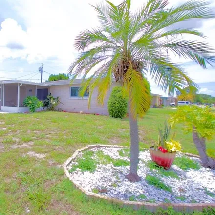 Buy this 3 bed house on 2423 Tahitian Drive in Holiday, FL 34691