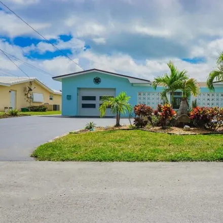 Buy this 4 bed house on 498 Southwest 18th Street in Lyons Park, Pompano Beach