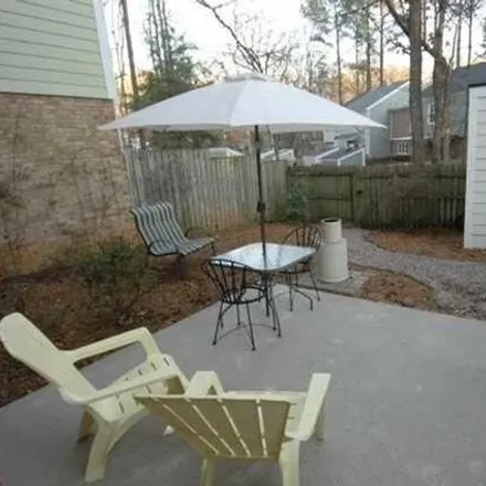 Rent this 4 bed townhouse on 1165 Collington Drive in Cary, NC 27511