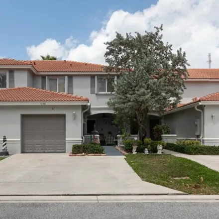 Buy this 3 bed townhouse on 7146 Hawks Nest Terrace in Riviera Beach, FL 33407