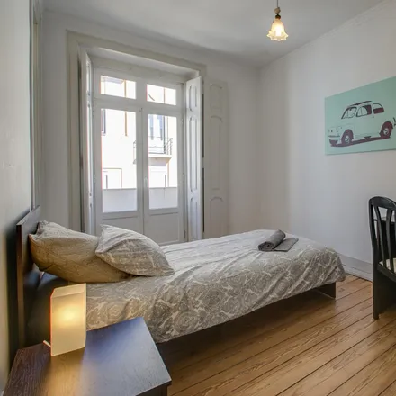 Rent this 4 bed room on Rua Carvalho Araújo 95 in 1900-140 Lisbon, Portugal