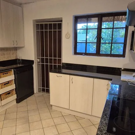 Rent this 4 bed apartment on Isipingo Road in Paulshof, Sandton