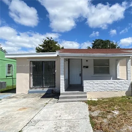 Rent this 2 bed house on 1541 Northwest 55th Terrace in Liberty Square, Miami