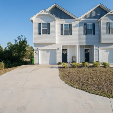 Buy this 3 bed townhouse on 250 Currituck Drive in Holly Ridge, NC 28445