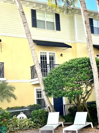 Rent this 3 bed townhouse on 2259 Northeast 9th Avenue in Coral Estates, Wilton Manors