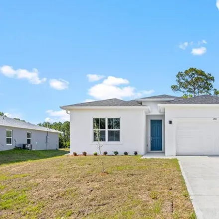 Buy this 4 bed house on 495 Harrison Street Southwest in Palm Bay, FL 32908