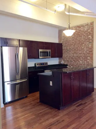 Rent this 2 bed condo on 311 W BALTIMORE