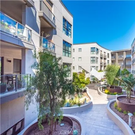 Rent this 2 bed condo on Lennox in 402 Rockefeller, Irvine