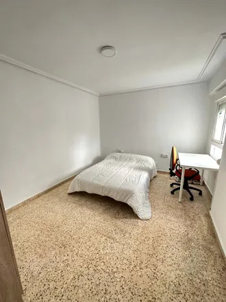 Rent this 5 bed room on Plaça de la Constitució in 46100 Burjassot, Spain