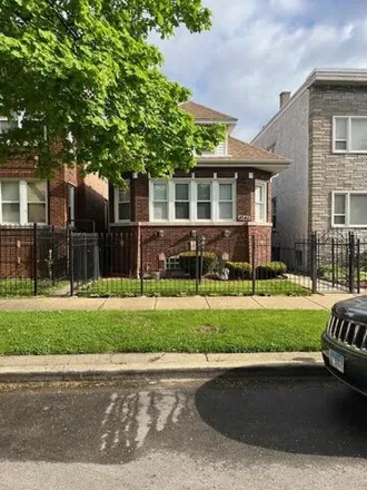 Buy this 4 bed house on 4946 West Walton Street in Chicago, IL 60651