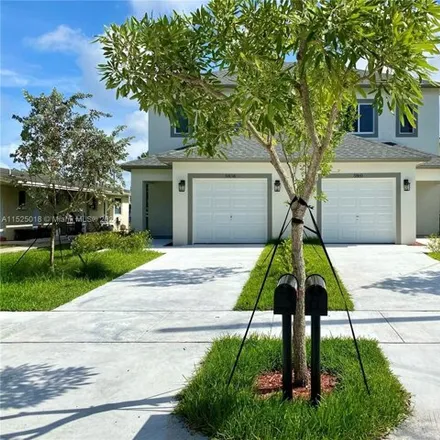 Rent this 3 bed townhouse on 5890 Lincoln Street in Hollywood, FL 33021