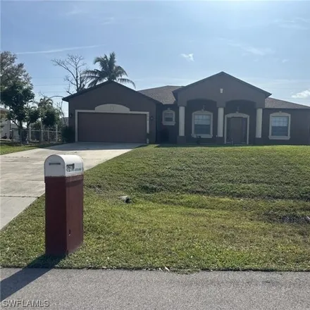 Buy this 4 bed house on 318 Southwest 21st Avenue in Cape Coral, FL 33991