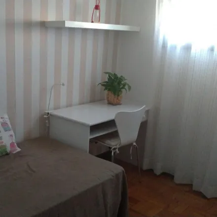 Rent this 4 bed room on Turiscar in Rua de Cinco de Outubro, 4100-173 Porto