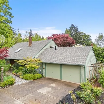 Buy this 4 bed house on 8520 Southwest Bridletrail Avenue in Beaverton, OR 97008