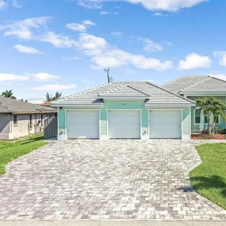 Buy this 4 bed house on 1103 Sw 41st St in Cape Coral, Florida