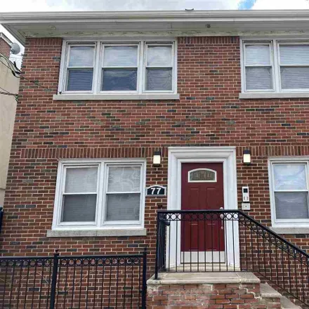 Rent this 2 bed townhouse on 75 Hutton Street in Jersey City, NJ 07307