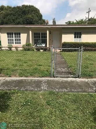 Buy this 3 bed house on 3325 Northwest 7th Court in Browardale, Lauderhill
