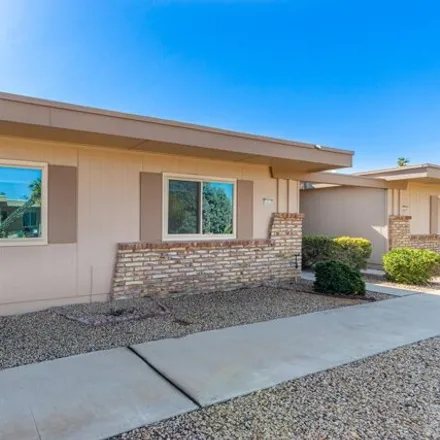 Buy this 2 bed house on 14032 North Palm Ridge Drive West in Sun City CDP, AZ 85351