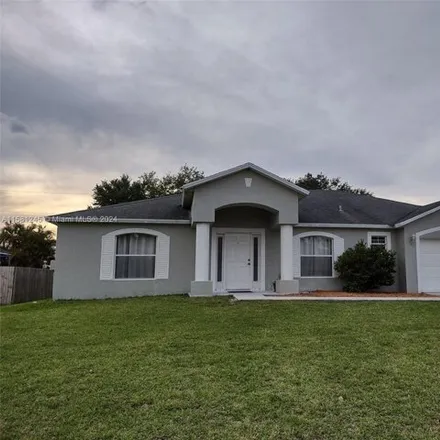 Rent this 4 bed house on 318 Southwest Kestor Drive in Port Saint Lucie, FL 34953