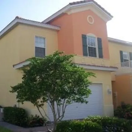 Rent this 3 bed townhouse on 16179 Via Solera Circle in Cypress Cove Villas, Lee County