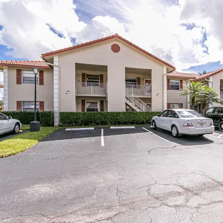 Buy this 2 bed condo on 3041 Holiday Springs Boulevard in Coral Springs, FL 33063